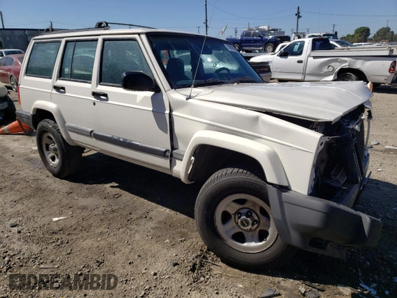1999 Jeep Cherokee Sport with VIN 1J4FT68S9XL627003, listed as a Copart auction lot 49478595 with 320,444 mi miles and Salvage title. Bid and sale history available at DreamBid. Image 4.