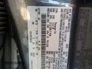 2014 Ford Focus Titanium with VIN 1FADP3N24EL269008, listed as a Copart auction lot 56396975 with 116,856 mi miles and Salvage title. Bid and sale history available at DreamBid. Image 12.