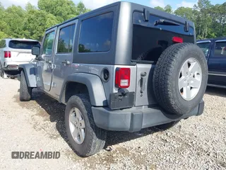 2018 Jeep Wrangler Unlimited Sport S z VIN 1C4HJWDG2JL929231, wystawiony jako IAAI lot #42282904 z przebiegiem 150 362 mil mil oraz . Historia ofert i sprzedaży dostępna na DreamBid. Obrazek 3.