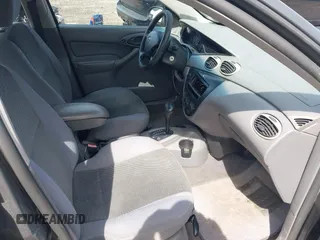 2004 Ford Focus SE with VIN 1FAFP34Z64W145178, listed as a IAAI auction lot 41962429 with 274,025 mi miles and . Bid and sale history available at DreamBid. Image 5.