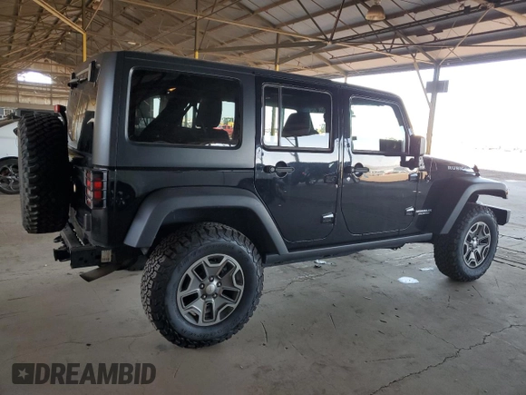 2015 Jeep Wrangler Unlimited Rubicon Hard Rock with VIN 1C4HJWFG1FL532288, listed as a Copart auction lot 62262545 with 91,807 mi miles and Salvage title. Bid and sale history available at DreamBid. Image 3.