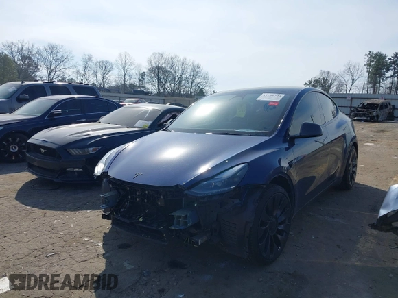 2022 Tesla Model Y Performance with VIN 7SAYGDEF7NF497076, listed as a IAAI auction lot 41759793 with 46,970 mi miles and . Bid and sale history available at DreamBid. Image 19.