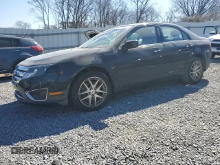 2012 Ford Fusion SEL z VIN 3FAHP0JG5CR272564, wystawiony jako Copart lot #46808055 z przebiegiem 172 794 mil mil oraz Czysty tytuł • Clean title. Historia ofert i sprzedaży dostępna na DreamBid. Obrazek 1.