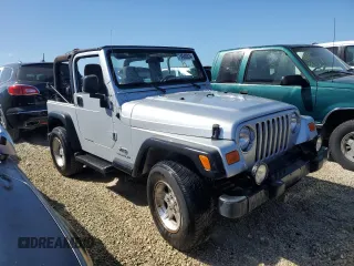 2004 Jeep Wrangler Sport with VIN 1J4FA49SX4P776775, listed as a Copart auction lot 74946824 with Not Provided miles and Salvage Title. Bid and sale history available at carsss.com. Image 4.