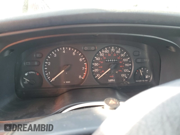 1996 Mercury Mystique z VIN 1MELM6532TK639432, wystawiony jako Copart lot #41884055 z przebiegiem 134 991 mil mil oraz Tytuł czysty. Historia ofert i sprzedaży dostępna na DreamBid. Obrazek 9.