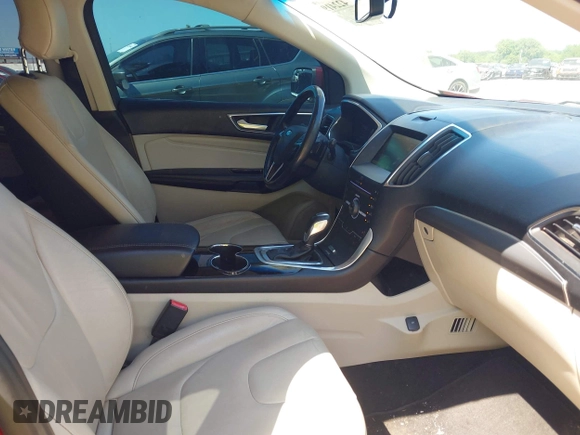 2015 Ford Edge Titanium z VIN 2FMTK3K97FBB06890, wystawiony jako IAAI lot #42241919 z przebiegiem 179 181 mil mil oraz . Historia ofert i sprzedaży dostępna na DreamBid. Obrazek 5.