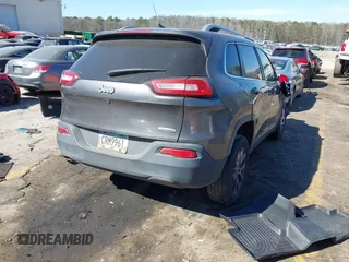 2014 Jeep Cherokee Latitude with VIN 1C4PJLCB1EW153825, listed as a IAAI auction lot 41675220 with 208,943 mi miles. Bid and sale history available at carsss.com. Image 4.