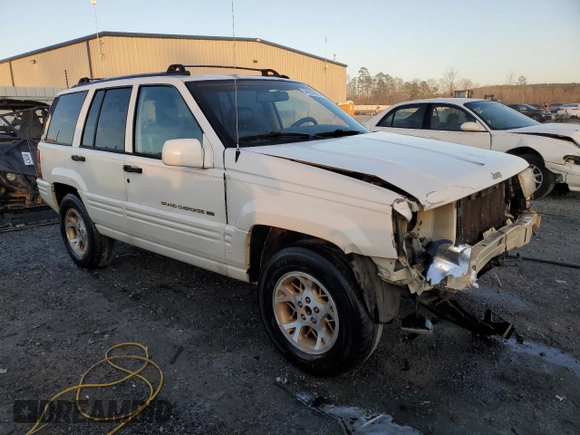 1996 Jeep Grand Cherokee z VIN 1J4FX78S6TC221815, wystawiony jako Copart lot #44000615 z przebiegiem 287 308 mil mil oraz Szkoda całkowita • Salvage title. Historia ofert i sprzedaży dostępna na DreamBid. Obrazek 4.