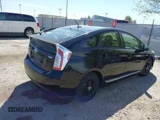 2013 Toyota Prius One with VIN JTDKN3DU9D1682269, listed as a IAAI auction lot 42100973 with 126,058 mi miles. Bid and sale history available at carsss.com. Image 4.