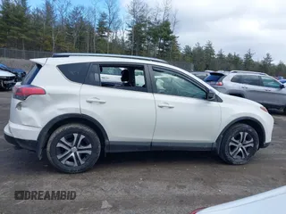 2018 Toyota RAV4 LE with VIN JTMBFREV5JJ738405, listed as a IAAI auction lot 41956145 with 100,593 mi miles and . Bid and sale history available at DreamBid. Image 14.