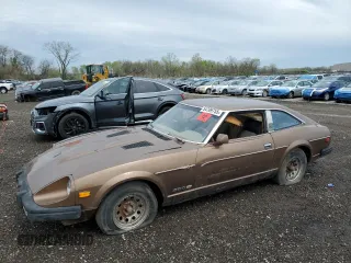 1979 Datsun 280ZX z VIN HGS130115983, wystawiony jako Copart lot #54709755 z przebiegiem 74 026 mil mil oraz Tytuł czysty. Historia ofert i sprzedaży dostępna na DreamBid. Obrazek 1.