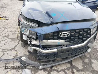 2021 Hyundai Santa Fe SE with VIN 5NMS14AJ2MH329146, listed as a IAAI auction lot 42342969 with 49,194 mi miles and . Bid and sale history available at DreamBid. Image 6.