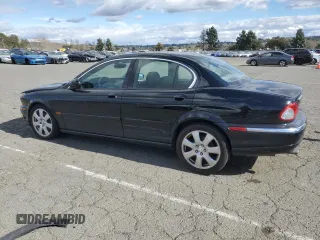 2004 Jaguar X-Type with VIN SAJEA51C74WD56736, listed as a Copart auction lot 48038295 with 115,817 mi miles and Salvage Title. Bid and sale history available at DreamBid. Image 2.
