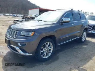 2014 Jeep Grand Cherokee Summit with VIN 1C4RJFJM5EC377129, listed as a IAAI auction lot 41763932 with 187,561 mi miles and . Bid and sale history available at DreamBid. Image 17.