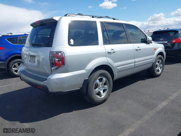 2007 Honda Pilot EX-L with VIN 5FNYF28677B005956, listed as a IAAI auction lot 41948401 with 185,599 mi miles. Bid and sale history available at carsss.com. Image 4.