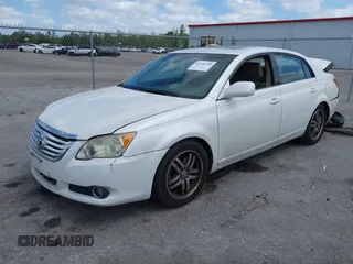 2009 Toyota Avalon XL with VIN 4T1BK36BX9U326841, listed as a IAAI auction lot 42156100 with 166,999 mi miles and . Bid and sale history available at DreamBid. Image 2.