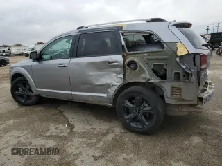 2019 Dodge Journey Crossroad z VIN 3C4PDDGGXKT771293, wystawiony jako Copart lot #80137264 z przebiegiem 101 396 mil mil oraz Szkoda całkowita • Salvage title. Historia ofert i sprzedaży dostępna na DreamBid. Obrazek 2.