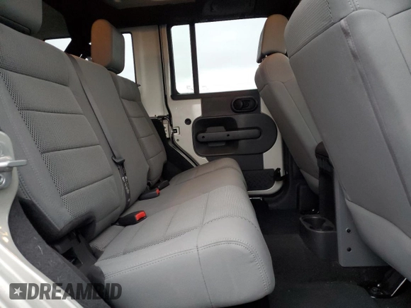 2007 Jeep Wrangler Unlimited Rubicon с VIN 1J8GA691X7L191115, выставлен на аукционе Copart как лот 87523925 с пробегом 85 709 миль миль и Списание • Salvage title. История ставок и продаж доступна на DreamBid. Изображение 11.