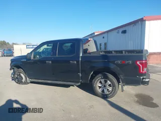 2015 Ford F-150 XLT with VIN 1FTEW1E86FFC00959, listed as a IAAI auction lot 41581711 with 130,298 mi miles. Bid and sale history available at carsss.com. Image 14.