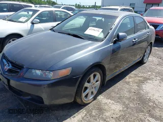 2005 Acura TSX with VIN JH4CL96935C016390, listed as a IAAI auction lot 42296236 with 125,033 mi miles and . Bid and sale history available at DreamBid. Image 2.