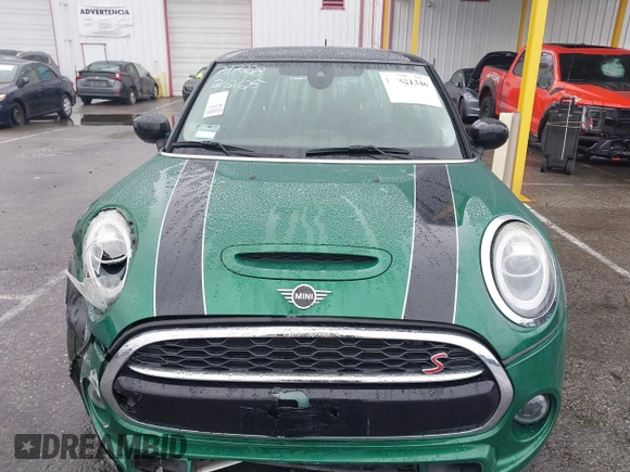 2020 MINI Hardtop Cooper S z VIN WMWXR5C08L2L85651, wystawiony jako IAAI lot #41521346 z przebiegiem 40 863 mil mil oraz . Historia ofert i sprzedaży dostępna na DreamBid. Obrazek 13.