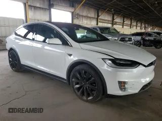 2018 Tesla Model X 75D with VIN 5YJXCBE23JF133589, listed as a Copart auction lot 55573715 with 89,234 mi miles and Salvage Title. Bid and sale history available at DreamBid. Image 4.