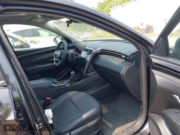 2023 Hyundai Tucson SEL with VIN 5NMJFCAE3PH181507, listed as a IAAI auction lot 42437052 with 18,462 mi miles and . Bid and sale history available at DreamBid. Image 5.