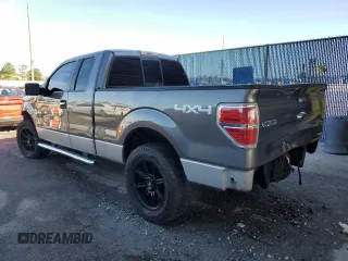 2014 Ford F-150 XL with VIN 1FTFX1EF9EFB27276, listed as a Copart auction lot 60633735 with 131,693 mi miles and Salvage title. Bid and sale history available at DreamBid. Image 2.