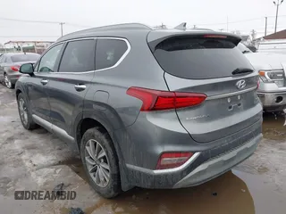 2020 Hyundai Santa Fe SEL with VIN 5NMS3CAD1LH157043, listed as a IAAI auction lot 41706684 with 55,674 mi miles. Bid and sale history available at carsss.com. Image 3.