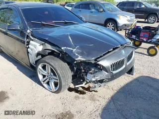 2014 BMW 5 Series 535i with VIN WBA5B1C54ED475113, listed as a IAAI auction lot 42077901 with 145,341 mi miles. Bid and sale history available at carsss.com. Image 6.