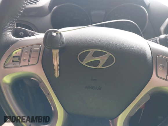 2010 Hyundai Tucson GLS with VIN KM8JU3AC0AU070395, listed as a IAAI auction lot 41933773 with 18,097 mi miles and . Bid and sale history available at DreamBid. Image 11.
