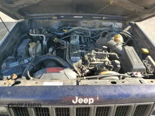 1998 Jeep Cherokee Sport with VIN 1J4FT68S5WL136989, listed as a Copart auction lot 81035084 with 140,848 mi miles and Salvage Title. Bid and sale history available at carsss.com. Image 13.