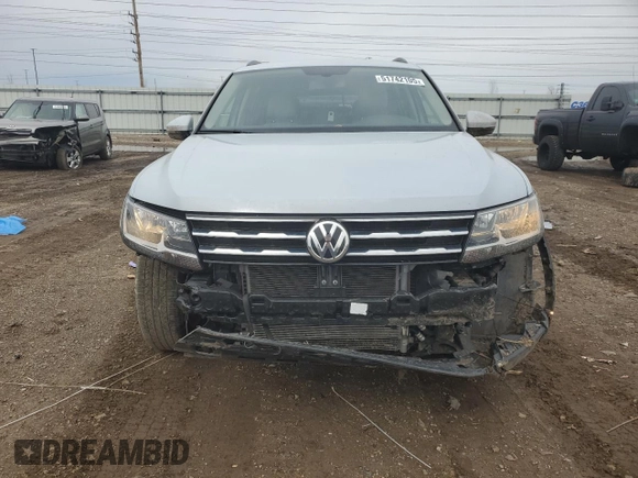 2018 Volkswagen Tiguan SEL z VIN 3VV3B7AX2JM001338, wystawiony jako Copart lot #51742105 z przebiegiem 71 555 mil mil oraz Szkoda całkowita • Salvage title. Historia ofert i sprzedaży dostępna na DreamBid. Obrazek 5.