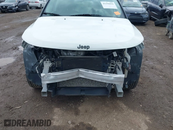 2021 Jeep Compass Altitude with VIN 3C4NJDBBXMT586529, listed as a IAAI auction lot 42296016 with 71,789 mi miles and . Bid and sale history available at DreamBid. Image 6.
