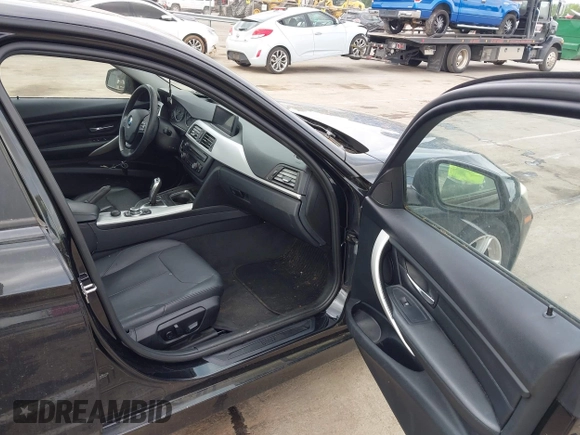 2012 BMW 3 Series 328i with VIN WBA3A5G51CNP17522, listed as a IAAI auction lot 42124868 with 154,385 mi miles and . Bid and sale history available at carsss.com. Image 5.