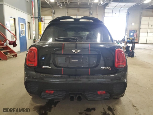 2016 MINI Cooper Hardtop 4 Door S with VIN WMWXU3C5XG2B63166, listed as a Copart auction lot 84016934 with 58,921 mi miles and Salvage Title. Bid and sale history available at carsss.com. Image 6.