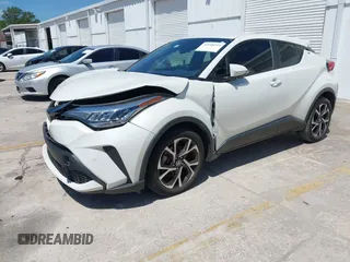 2021 Toyota C-HR LE with VIN JTNKHMBX8M1104427, listed as a IAAI auction lot 41948234 with 24,415 mi miles. Bid and sale history available at carsss.com. Image 17.