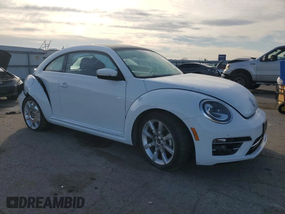 2019 Volkswagen Beetle SE with VIN 3VWJD7AT9KM720369, listed as a Copart auction lot 43407005 with Not provided miles and Salvage title. Bid and sale history available at DreamBid. Image 4.