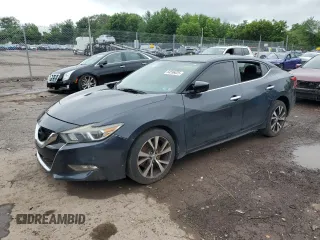 2016 Nissan Maxima SL with VIN 1N4AA6AP1GC439691, listed as a Copart auction lot 64596025 with 152,174 mi miles and Salvage title. Bid and sale history available at DreamBid. Image 1.