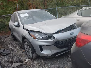 2020 Ford Escape Titanium with VIN 1FMCU9J96LUB18419, listed as a IAAI auction lot 40612100 with 40,041 mi miles and . Bid and sale history available at DreamBid. Image 1.