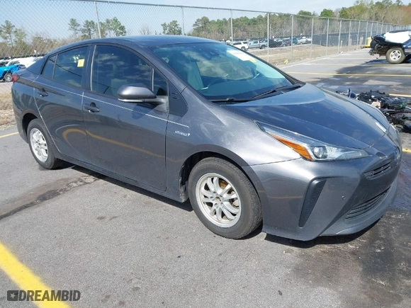 2021 Toyota Prius L Eco with VIN JTDKAMFU4M3134778, listed as a IAAI auction lot 41843429 with 145,757 mi miles. Bid and sale history available at carsss.com. Image 1.