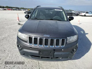 2016 Jeep Compass Sport SE with VIN 1C4NJDBBXGD523537, listed as a Copart auction lot 87664995 with 132,010 mi miles and Salvage title. Bid and sale history available at DreamBid. Image 5.