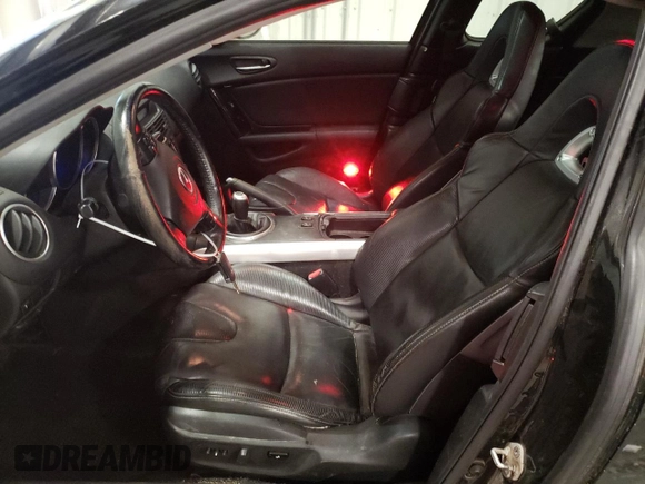 2005 Mazda RX-8 with VIN JM1FE173750144105, listed as a Copart auction lot 83917654 with 69,100 mi miles and Salvage Title. Bid and sale history available at DreamBid. Image 7.