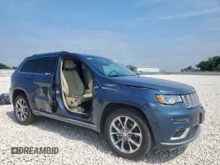 2021 Jeep Grand Cherokee Summit with VIN 1C4RJEJG2MC657402, listed as a Copart auction lot 59098465 with 61,442 mi miles and Salvage title. Bid and sale history available at DreamBid. Image 4.