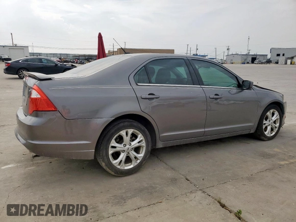 2012 Ford Fusion SE z VIN 3FAHP0HAXCR436084, wystawiony jako Copart lot #57390385 z przebiegiem 88 645 mil mil oraz Szkoda całkowita • Salvage title. Historia ofert i sprzedaży dostępna na DreamBid. Obrazek 3.