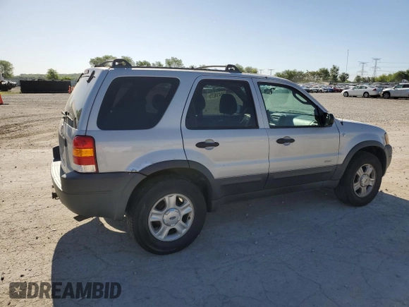 2002 Ford Escape XLT Choice with VIN 1FMCU04162KB00207, listed as a Copart auction lot 56414275 with 143,085 mi miles and Salvage title. Bid and sale history available at DreamBid. Image 3.