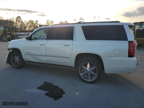 2015 Chevrolet Suburban LT with VIN 1GNSKJKC2FR638780, listed as a Copart auction lot 47360345 with 156,884 mi miles and Salvage Title. Bid and sale history available at carsss.com. Image 2.