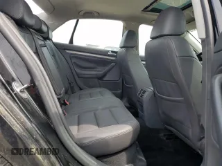 2007 Volkswagen Jetta Wolfsburg Edition z VIN 3VWEF71K77M087560, wystawiony jako Copart lot #60809985 z przebiegiem 151 561 mil mil oraz Szkoda całkowita • Salvage title. Historia ofert i sprzedaży dostępna na DreamBid. Obrazek 10.