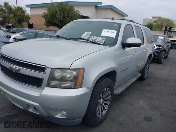 2010 Chevrolet Suburban LT with VIN 1GNUCJE03AR238548, listed as a IAAI auction lot 42104596 with 153,959 mi miles and . Bid and sale history available at DreamBid. Image 17.