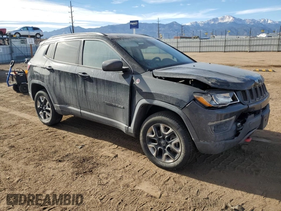2018 Jeep Compass Trailhawk with VIN 3C4NJDDB9JT337597, listed as a Copart auction lot 86314244 with 88,873 mi miles and Salvage Title. Bid and sale history available at carsss.com. Image 4.